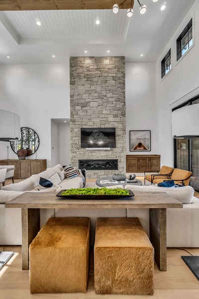 Cultured Stone Sculpted Ashlar Silver Shore warm gray thin stone on interior living room fireplace