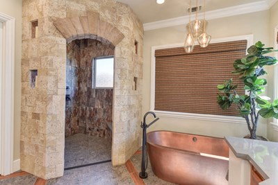 Eldorado Stone | Coastal Reed Sanibel tan thin stone on walk in shower