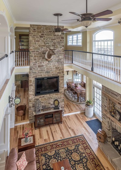Eldorado Stone Cypress Ridge Orchard warm gray and brown thin stone on interior fireplace